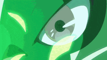 a close up of a cartoon character 's green eye