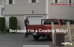 a chevrolet truck is parked in front of a house with the words because i 'm a cowboy baby on the bottom