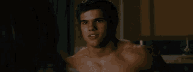 a shirtless man is talking to a woman and the word hey is above him