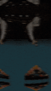 a blurry picture of a person swimming in a blue pool