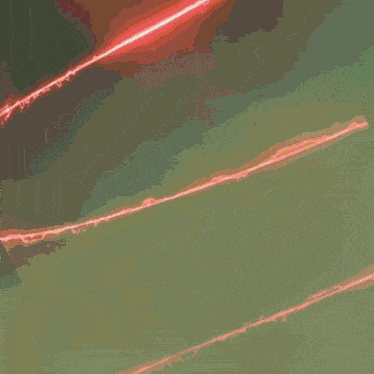a colorful background with a red light coming out of it