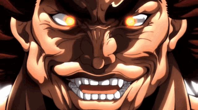 a close up of a cartoon character 's face with red eyes