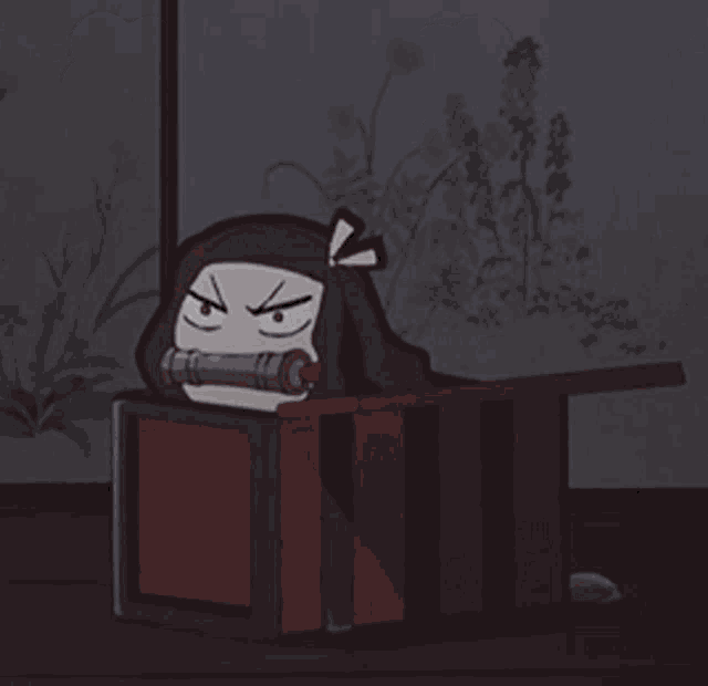 a cartoon character is laying in a box with a speech bubble above her head