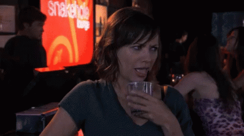 Trying To Drink Through A Straw When You'Re Drunk Like GIF - Parks And Rec Rashida Jones Ann Perkins GIFs