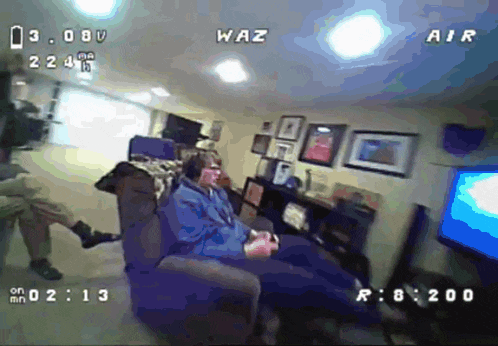 a video of a man playing a video game with the words waz and air visible