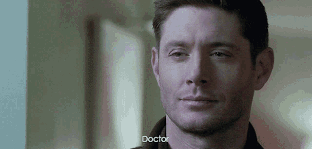 a close up of a man 's face with the word doctor visible