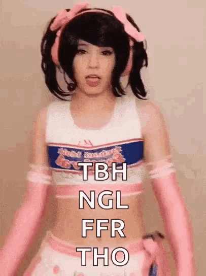 a girl in a cheerleader costume is wearing pink gloves and a wig .