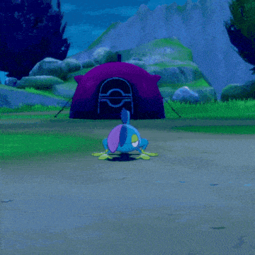 a blue and purple cartoon character with a purple hat
