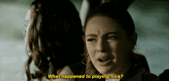 a girl is asking what happened to playing nice while another girl looks on