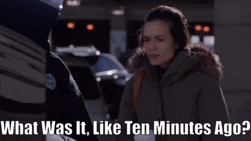 a woman talking to a police officer with the words " what was it like ten minutes ago " above her