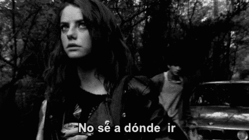 a black and white photo of a man and a woman with the words no se a donde ir above them