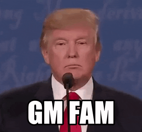 donald trump is speaking into a microphone and says gm fam