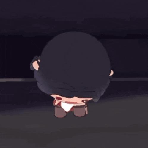 a doll with long black hair and red eyes is sitting on the ground