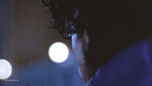 a close up of a man 's face with the words get on in the corner