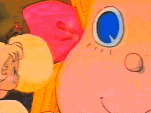 a close up of a cartoon character 's face with blue eyes