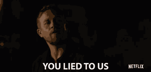 a man with a beard is saying you lied to us in a dark room .