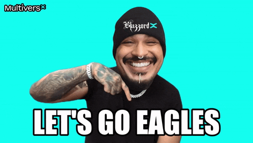 a man wearing a black shirt and a black beanie says let 's go eagles