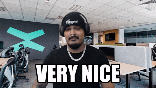 a man wearing headphones says very nice