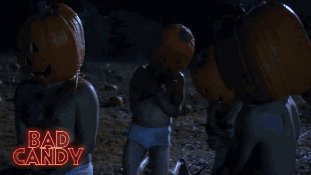 a group of children with pumpkins on their heads and the words bad candy written on the bottom