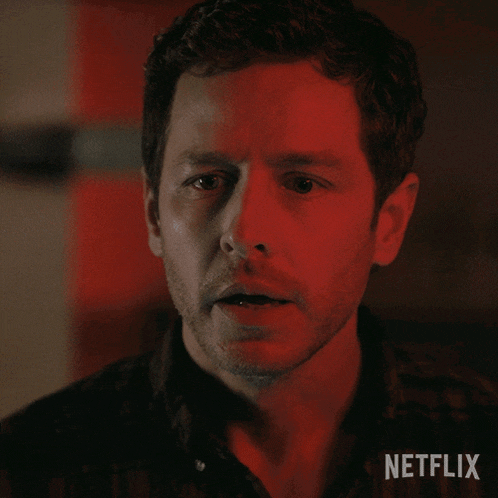 a man with a red background and the word no way on his face