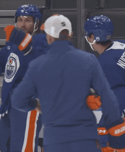 two edmonton oilers hockey players are celebrating