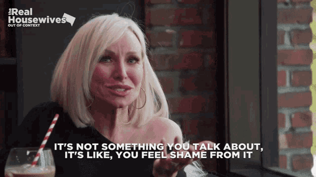a woman says it 's not something you talk about it 's like you feel shame from it while holding a drink