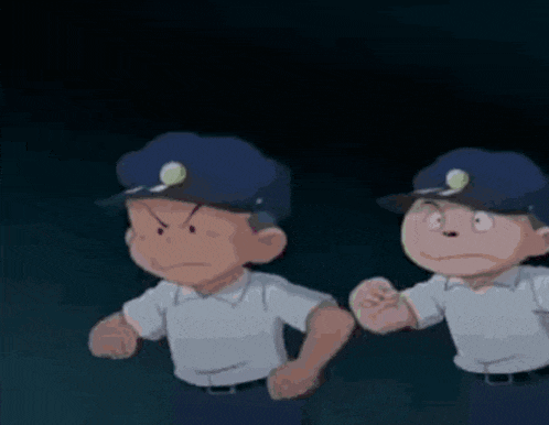 two cartoon police officers are walking in a dark room .