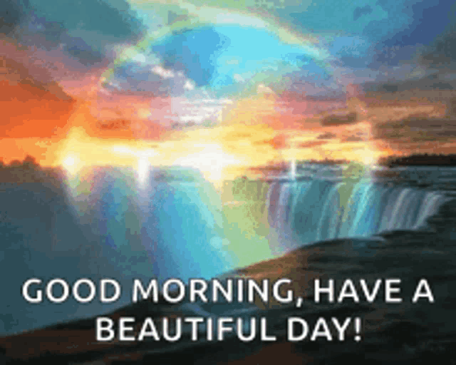 a waterfall with a rainbow in the sky and the words `` good morning , have a beautiful day '' .