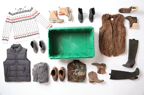 Packing Winter Fashion GIF - Clothes Fasion Winter Gear GIFs