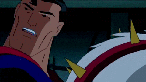 a close up of a cartoon character with spikes on his chest .