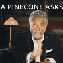 a man with a beard is giving a thumbs up sign .