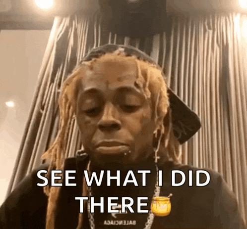 a man with dreadlocks says " see what i did there " in front of a curtain
