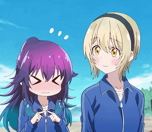 a girl with purple hair is making a funny face next to a girl with blonde hair
