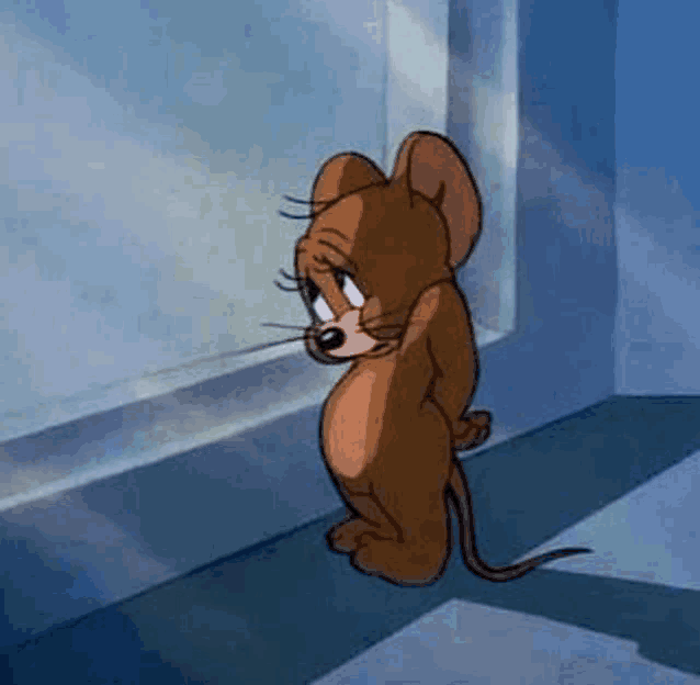 a cartoon mouse is looking out of a window .