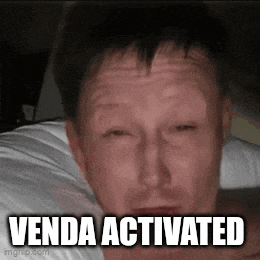 a man is laying in bed with his eyes closed and the words `` venda activated '' written on his face .