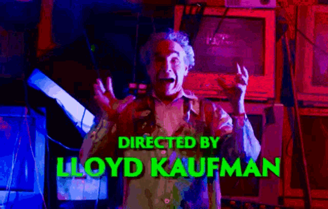 a man screams in front of a screen that says " directed by lloyd kaufman "