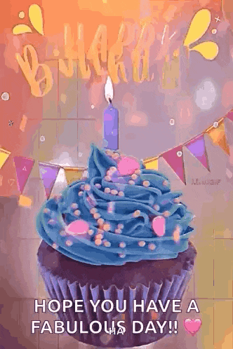 a cupcake with blue frosting and a candle on top of it