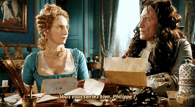 a man and a woman are sitting at a table and the woman says " vous vous sentez bien "