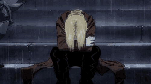 a cartoon character is sitting on a set of stairs with his head down .