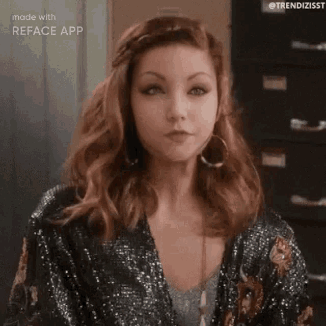 a woman in a sequined jacket and hoop earrings is making a face .