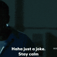 a man in a white tank top says " haha just a joke stay calm " .