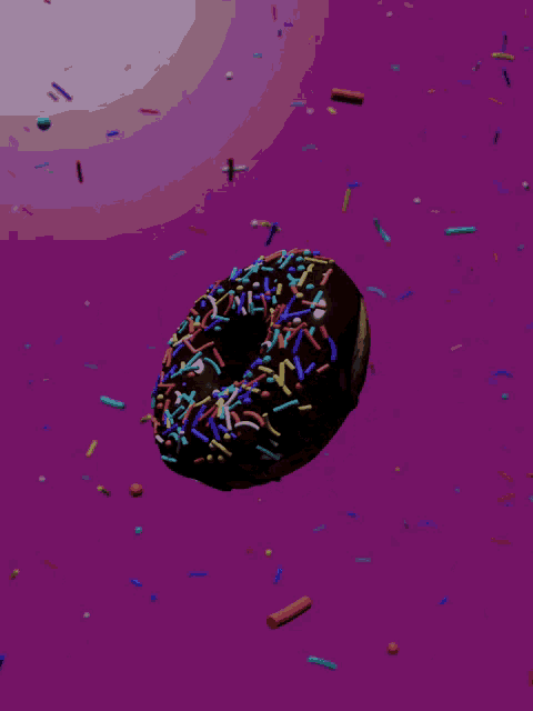 a donut with chocolate frosting and sprinkles on a pink background