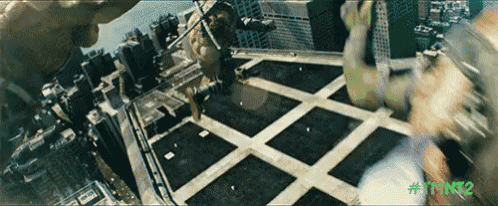 a hulk and a teenage mutant ninja turtle are fighting on a roof