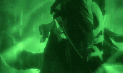 a close up of a person in a green light .