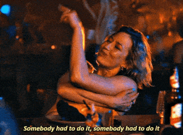 a woman hugging another woman with the words somebody had to do it