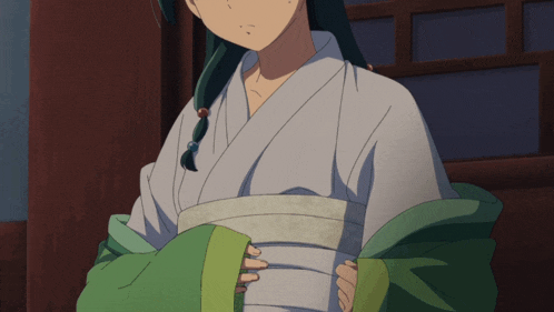 a girl with green hair is wearing a white and green outfit