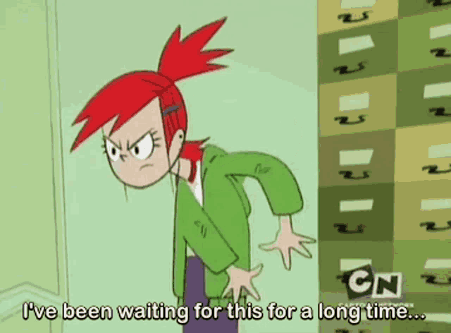 a cartoon of a girl with red hair says " i 've been waiting for this for a long time "