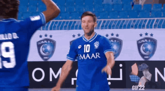 a soccer player wearing a number 10 jersey