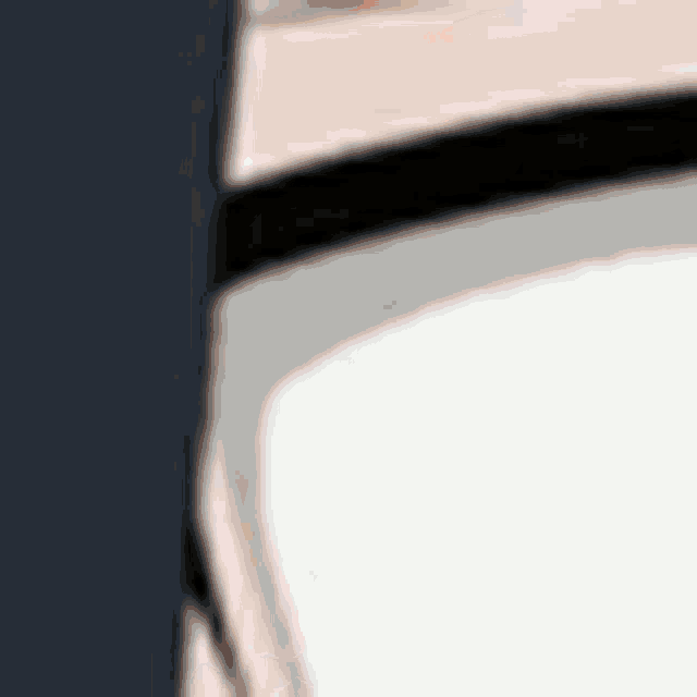 a close up of a person 's stomach with a black belt around it .