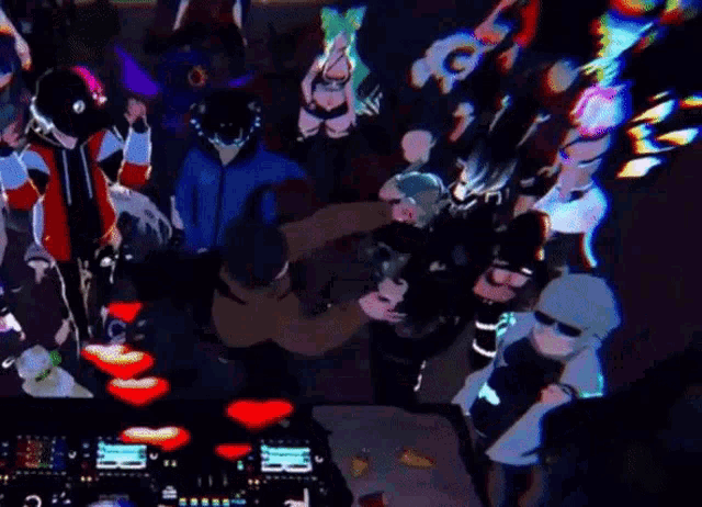 a group of people are standing around a table in a room .